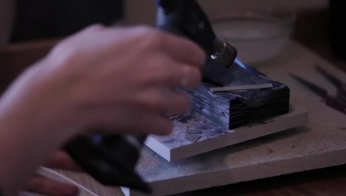 Bend the ring using pliers or a ring bending tool.