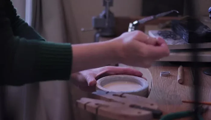 Solder the ring using hard solder and a soldering board.