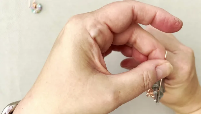 Adjust the shape as needed. Gently squish the wire to secure the shape.