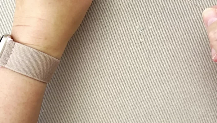 Secure the seed beads by wrapping the wire around the larger loop twice.