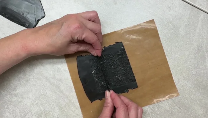 Cut the imprinted clay to your desired size.