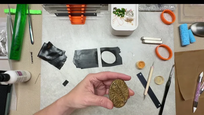 Bake the brooch again.