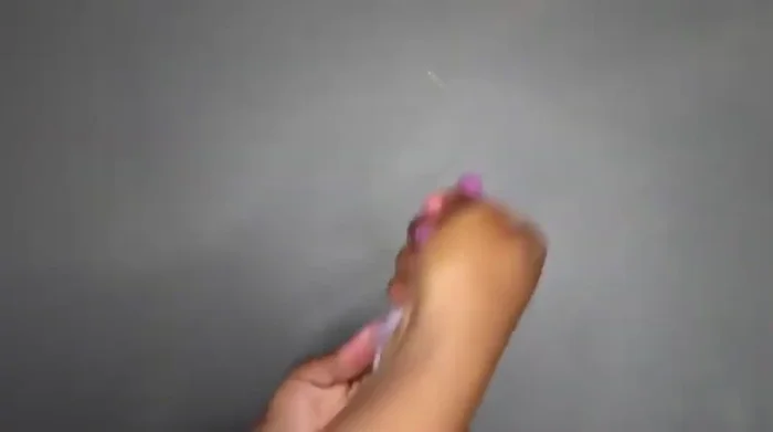 Cut the yarn and prepare a separate piece of yarn for tying.