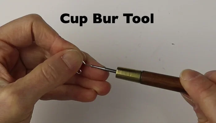 Harden the wire using nylon jaw pliers or a hammer.