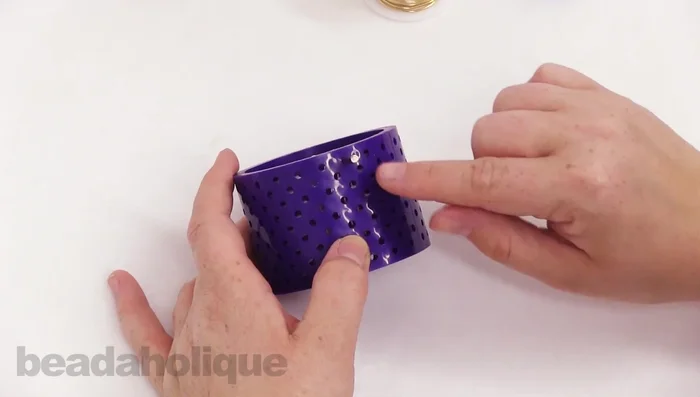 Set up the Artistic Wire 3D Bracelet Jig using only two pegs and backers. Adjust the distance between pegs to determine bangle size.