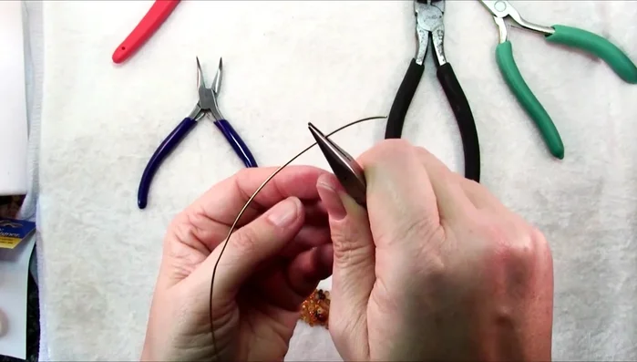 Cut and secure the short wire end.