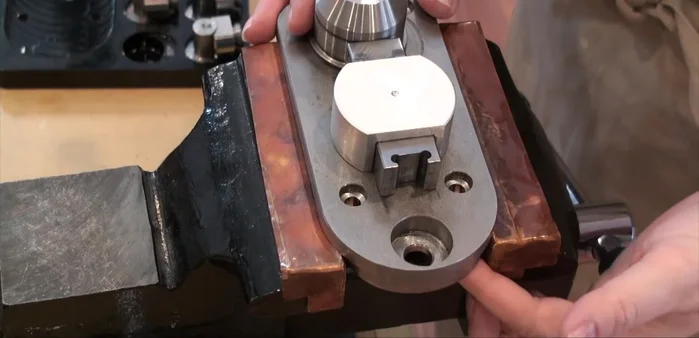 Install the 60-degree diamond bit into the ring bender.