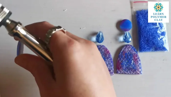 Apply matte varnish to protect the pan pastels.