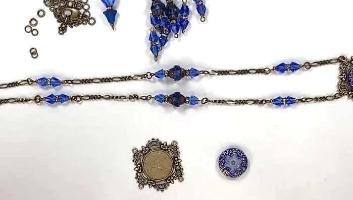 Attach the center stone and hanger: Attach the prepared hanger (CHM04485) to the back of the center stone setting.