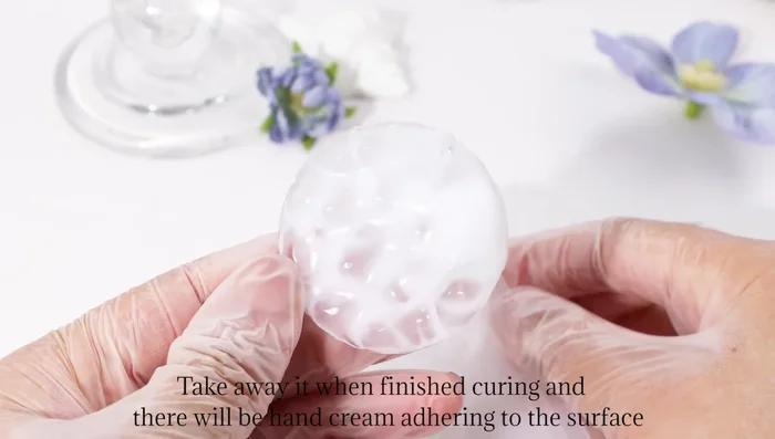 Remove the cured resin from the mold. Wash off any adhering hand cream with water.