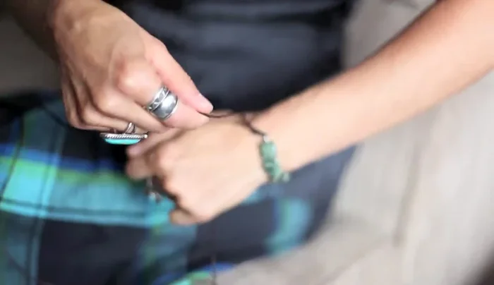 Final tightening: Adjust and tighten individual loops to even out the bracelet's fit against your wrist.