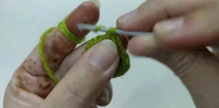 Round 7: Chain 1. Decrease stitches again (single crochet, single crochet) in each 2 stitches around (12 stitches total). Join with a slip stitch.