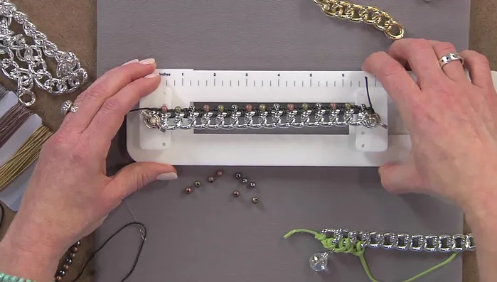 For smaller scale projects, use a bracelet station to hold your chain securely, preventing twisting.