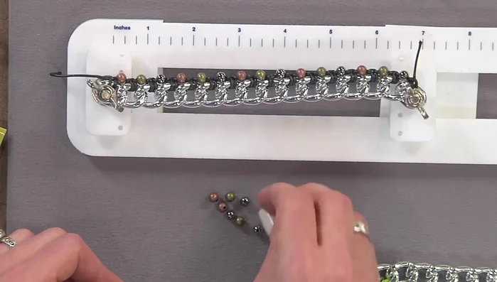 Use thinner cording (cotton cord is suggested) for beading, ensuring it can pass through your chosen beads.