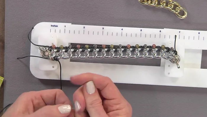 Continue the same knotting technique as before, adding beads between each knot.