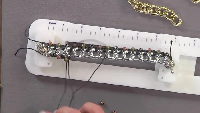 Once finished, tie a knot at the end, add glue for security, and attach a clasp.