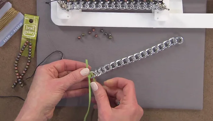 Continue this knotting process along the entire chain.