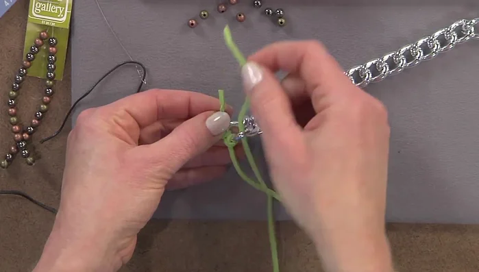 Continue this knotting process along the entire chain.