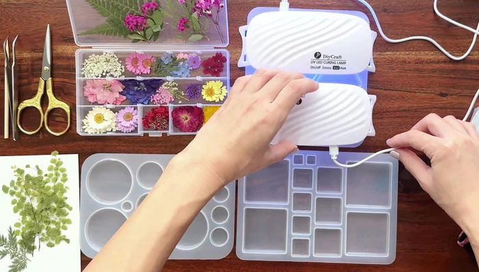 Cure first layer: Use UV lamps (5 minutes per lamp) to cure the resin.