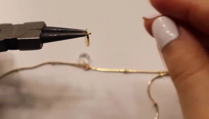 Attach charms to bracelet or existing jewelry.