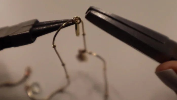 Attach charms to bracelet or existing jewelry.