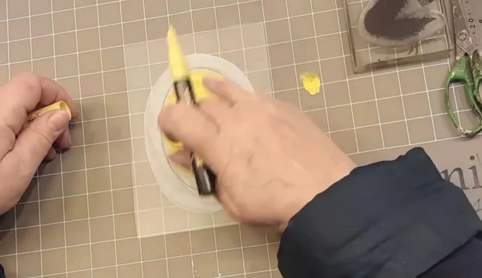 Base coat: Dab yellow Posca pen inside the drawn line to create a base for the image.