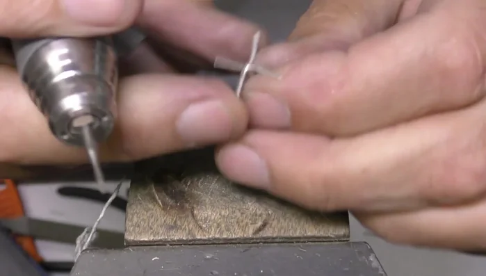 Create seating cuts in the claws using a tapered burr, avoiding excessive depth.