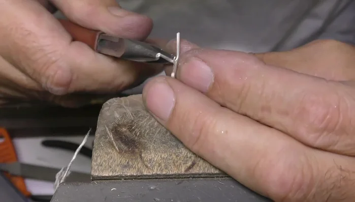 Set the stone, making adjustments to ensure a snug fit.