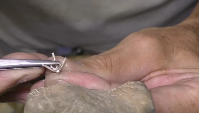 Set the stone, making adjustments to ensure a snug fit.