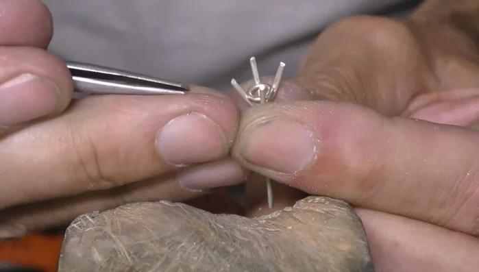 Set the stone, making adjustments to ensure a snug fit.