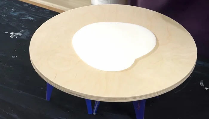 Apply a base coat of thinned titanium white with Vallejo pearl medium and gloss fluid medium.