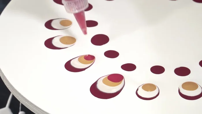 Add puddles of sparkly strawberry color (Quinacridone Crimson with gold and white).