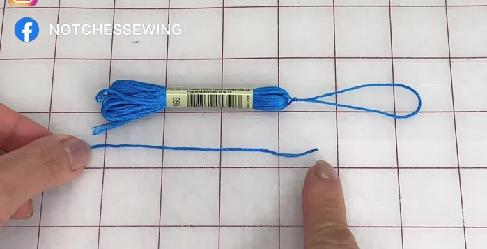 Thread the end through the loop and pull the top strand to close it up. Remove the sleeve and pull on the top strand until the loop disappears.