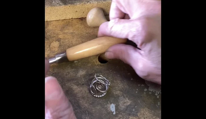 Set the stone using a bezel rocker to fold the bezel over the stone.