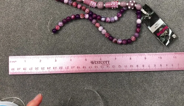 Prepare Cord: Cut a generous length of stretch cord (approximately 24 inches for a 7-inch bracelet). Flatten one end using flat-nose pliers for easier threading.