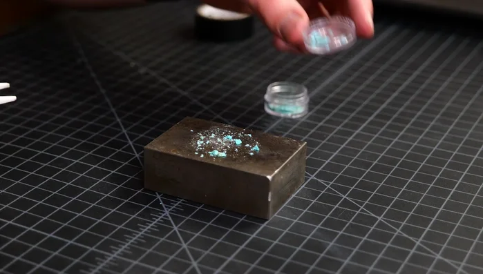 Secure the ring blank: Place the ring blank onto the prepared mandrel.