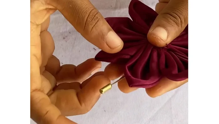 Embellish the front of the brooch as desired. 