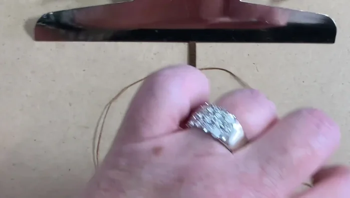 Pull up one bead on each side. This is the hardest part of the process.