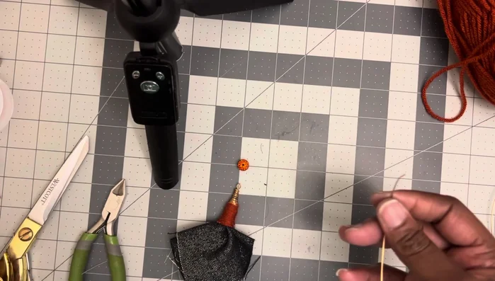 Add a clay bling bead to the top of the earring using a small loop of wire. Secure by wrapping and snipping the wire.