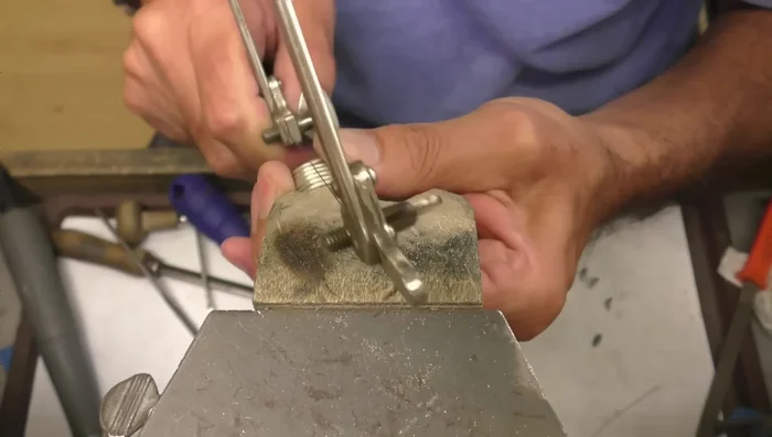 Prepare for soldering: Overlap and align the ends of each ring, ready for soldering. Add small pieces of hard solder to each joint.