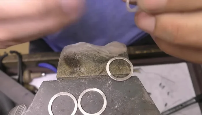 Flux and prepare for final solder: Apply flux to the marked areas of the ring.