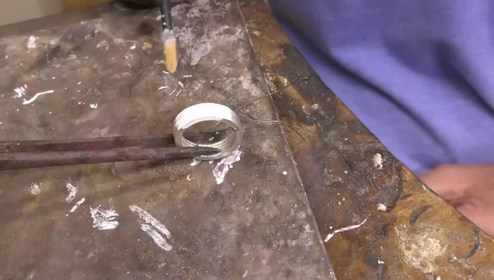 Final soldering: Add pre-cut pieces of medium solder to the fluxed areas. Control the heat to prevent the solder from running too far.