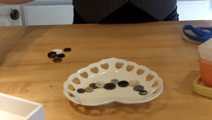 Thread the ribbon onto the collapsible needle.