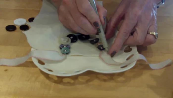 Cut out the 'U' shape, leaving a small margin around the traced line.