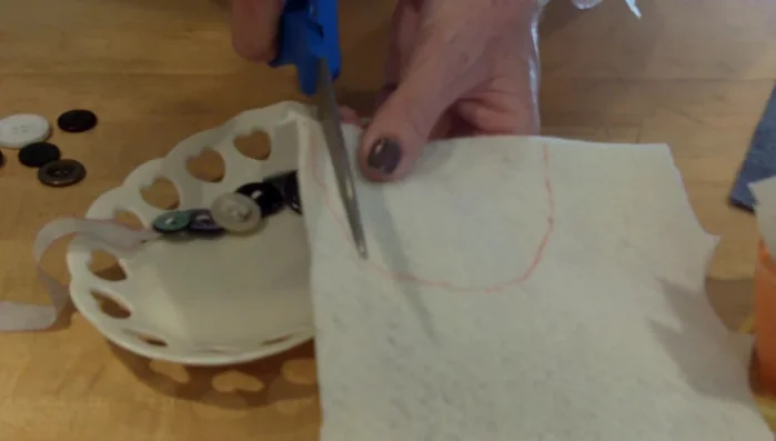 Cut out the 'U' shape, leaving a small margin around the traced line.