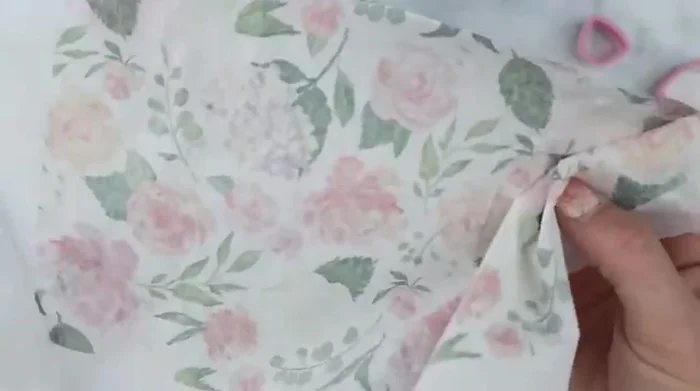 Carefully cut out the traced napkin pieces, ensuring no ink remains on the napkin.