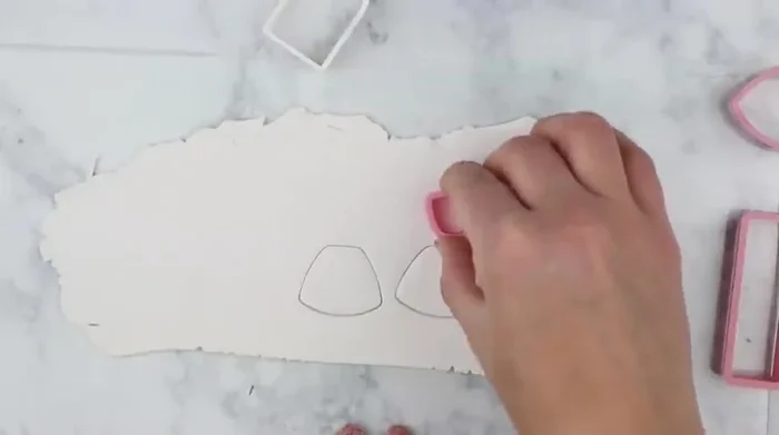 Cut out earring shapes from your base clay.