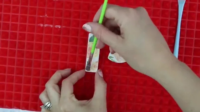 Seal the clay pieces with a water-based poly acrylic, resin, or Sculpey gloss glaze.