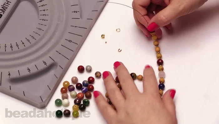 Coil the necklace gently to ensure proper slack and comfortable wear.