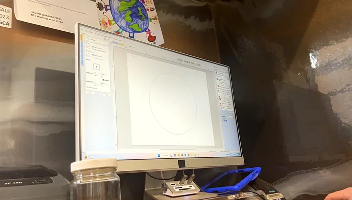 Use a CNC machine or hole saw to cut the resin block into a bracelet ring shape. (CNC is described in the video but a hole saw is a faster alternative).